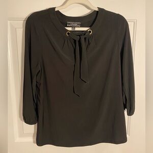 Corvia Black Tie-Neck Blouse with Gold Eyelets
